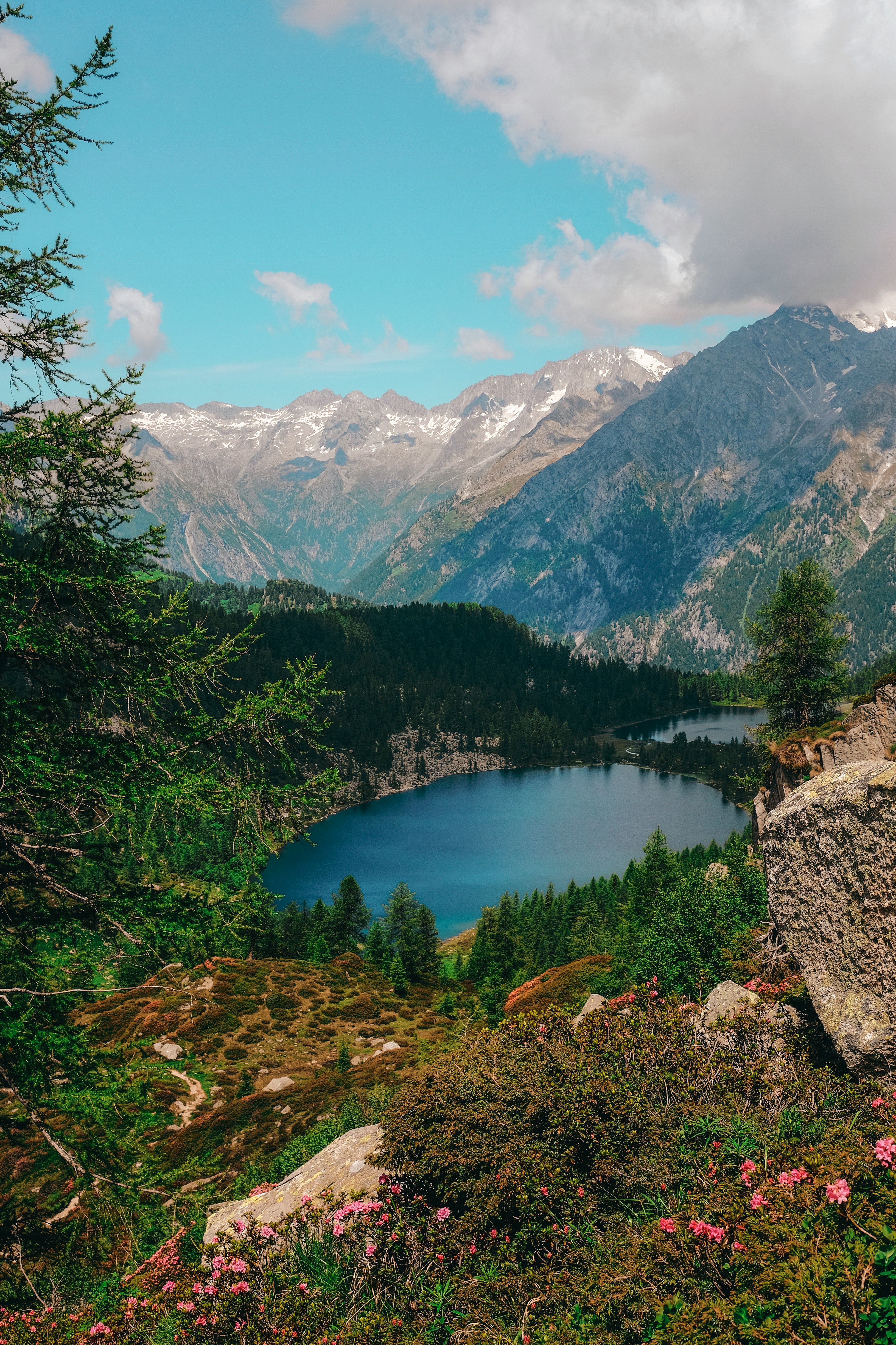 body of water surrounded by mountain range